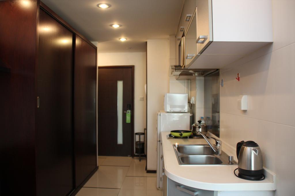 Shanghai Cosmo World Union Service Apartment Екстер'єр фото
