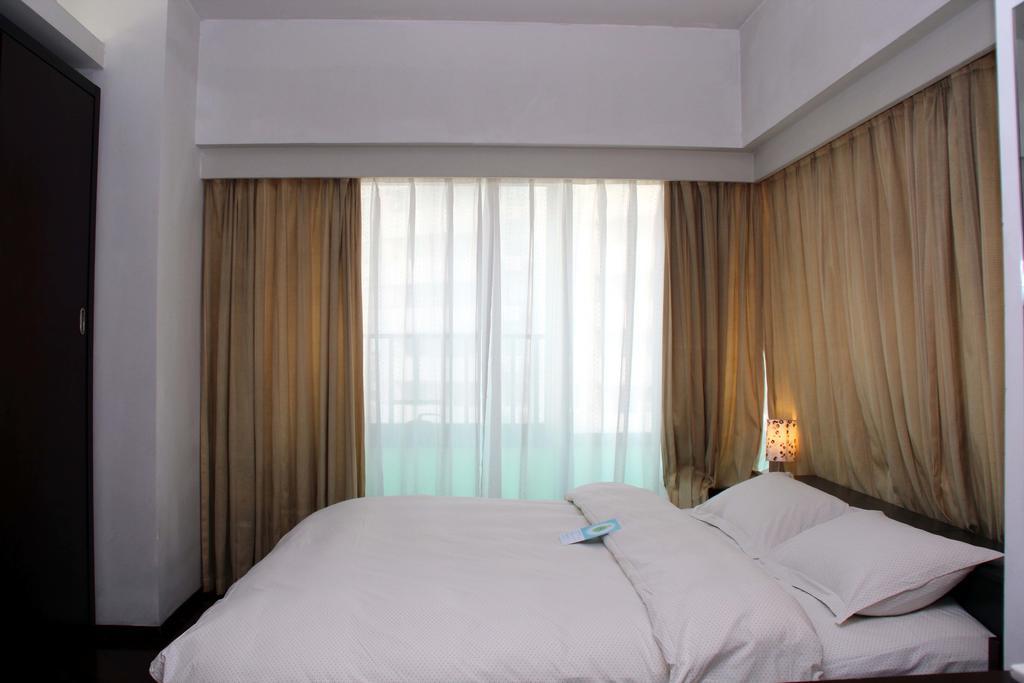 Shanghai Cosmo World Union Service Apartment Екстер'єр фото
