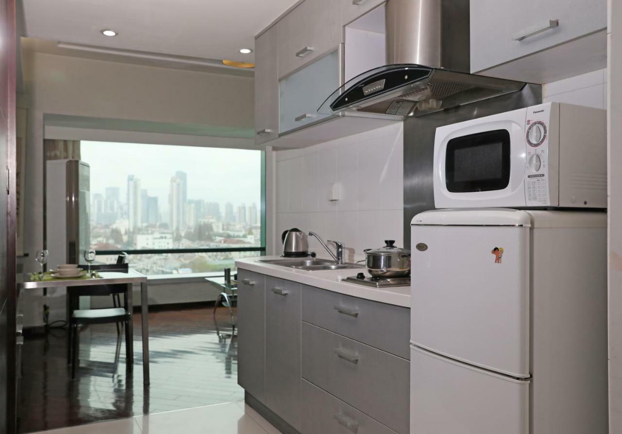 Shanghai Cosmo World Union Service Apartment Екстер'єр фото