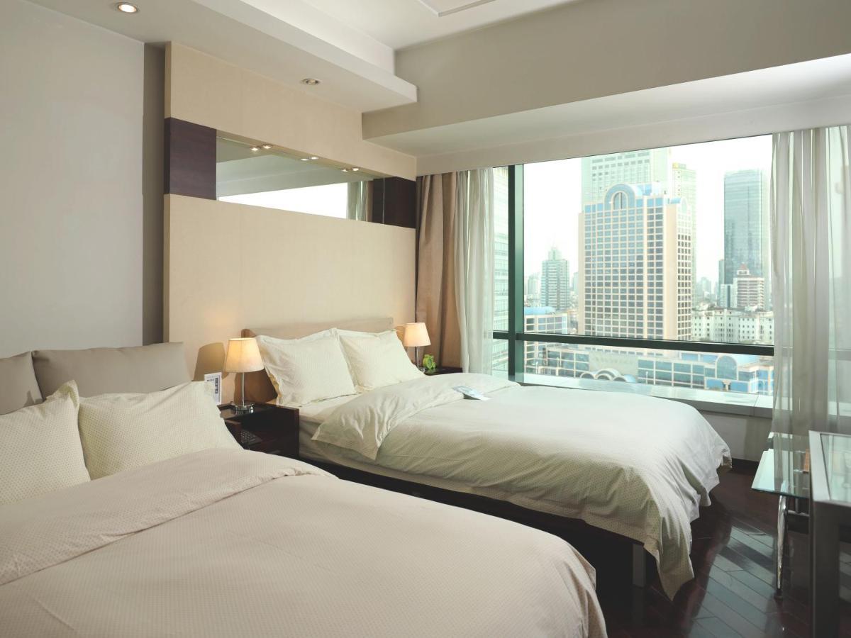 Shanghai Cosmo World Union Service Apartment Екстер'єр фото