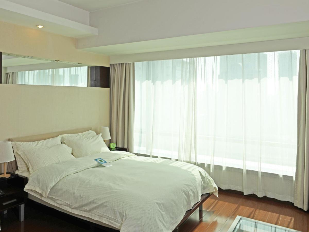 Shanghai Cosmo World Union Service Apartment Екстер'єр фото
