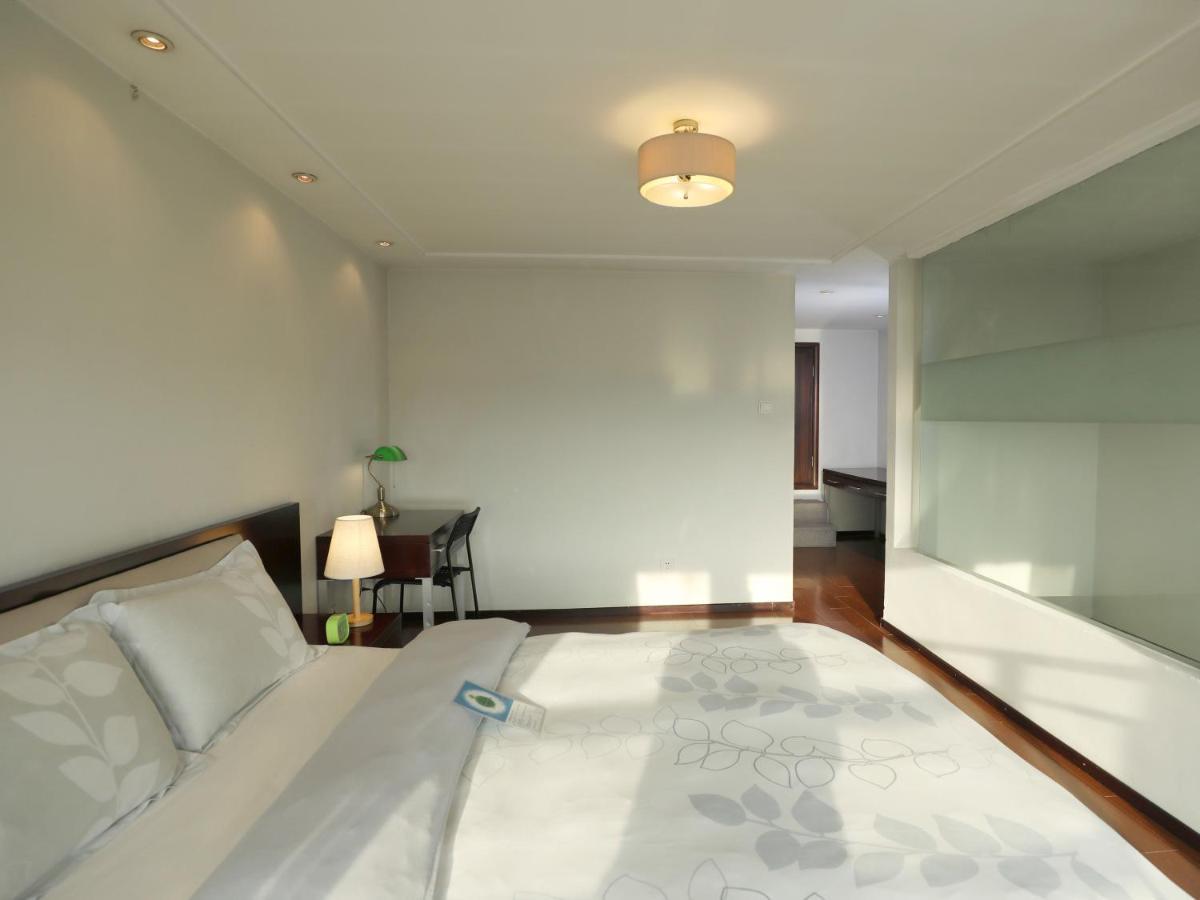 Shanghai Cosmo World Union Service Apartment Екстер'єр фото