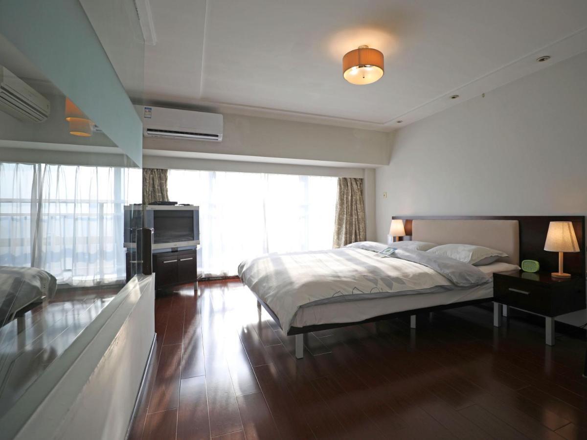 Shanghai Cosmo World Union Service Apartment Екстер'єр фото