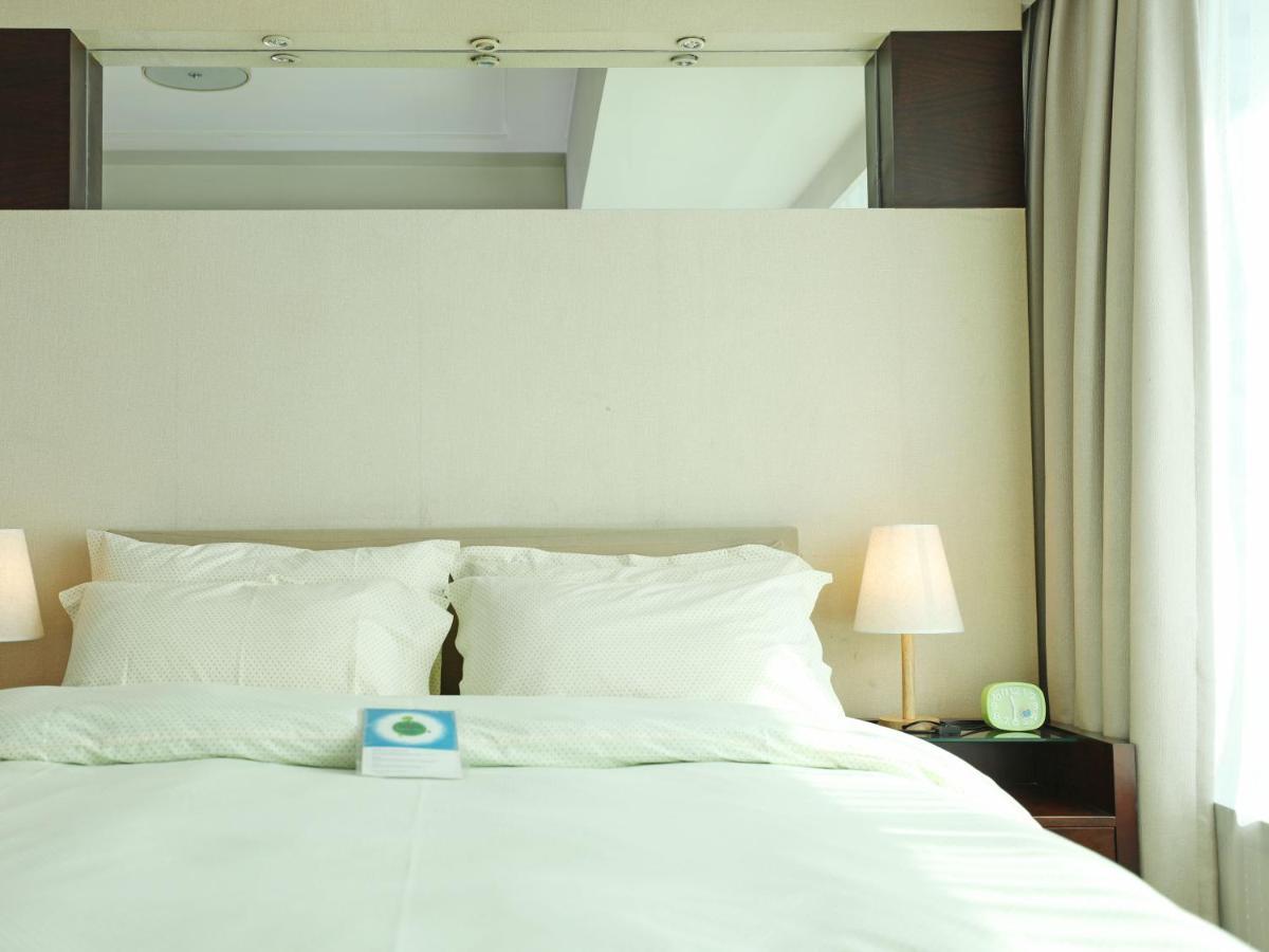 Shanghai Cosmo World Union Service Apartment Екстер'єр фото
