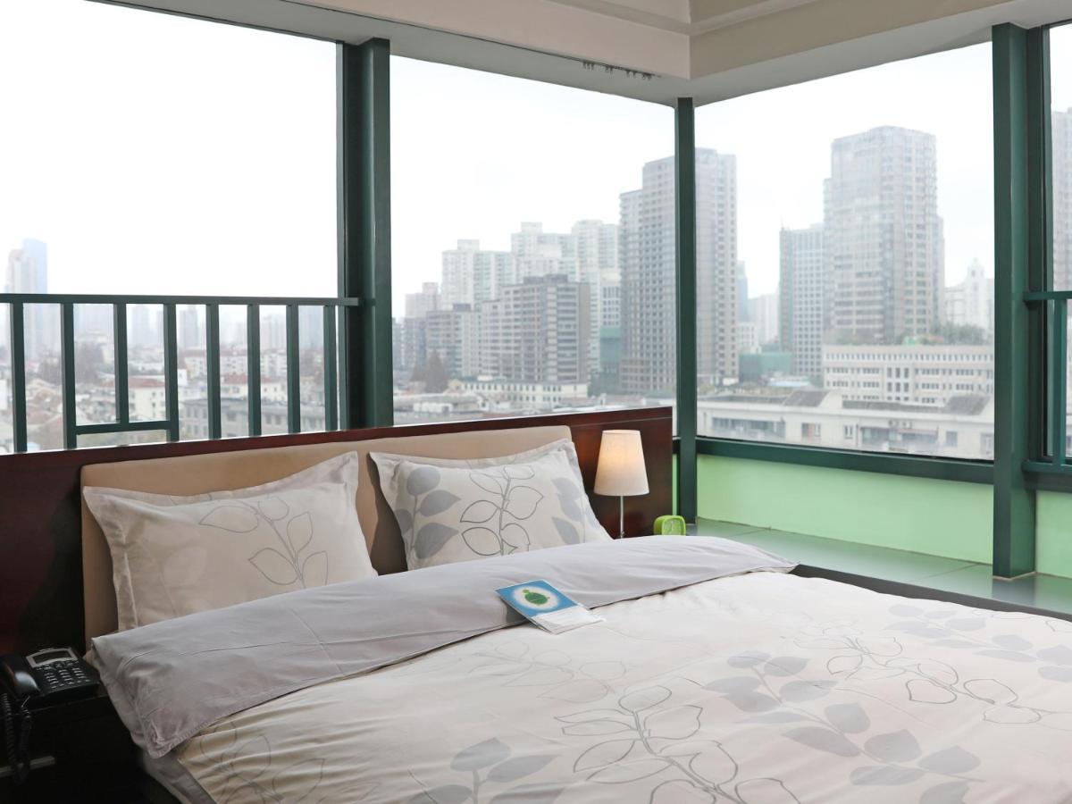 Shanghai Cosmo World Union Service Apartment Екстер'єр фото