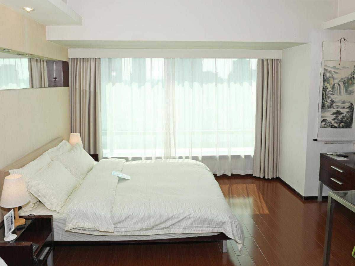 Shanghai Cosmo World Union Service Apartment Екстер'єр фото
