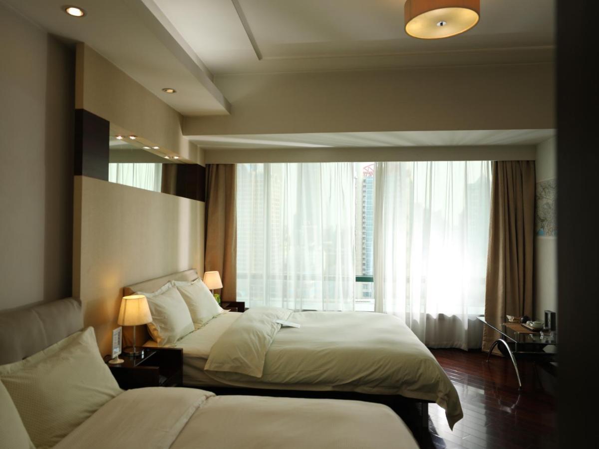 Shanghai Cosmo World Union Service Apartment Екстер'єр фото