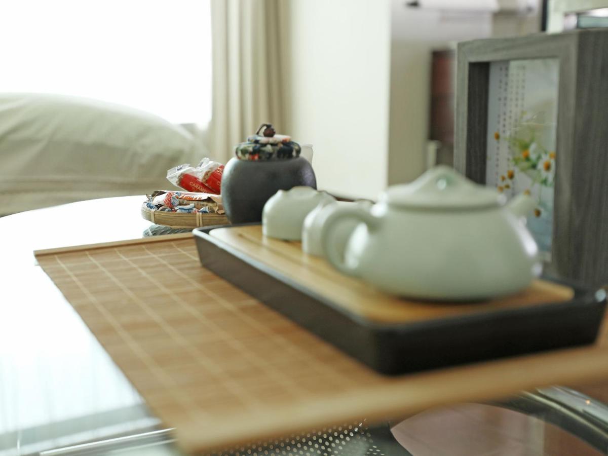 Shanghai Cosmo World Union Service Apartment Екстер'єр фото